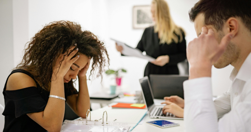 stressed woman working at the office